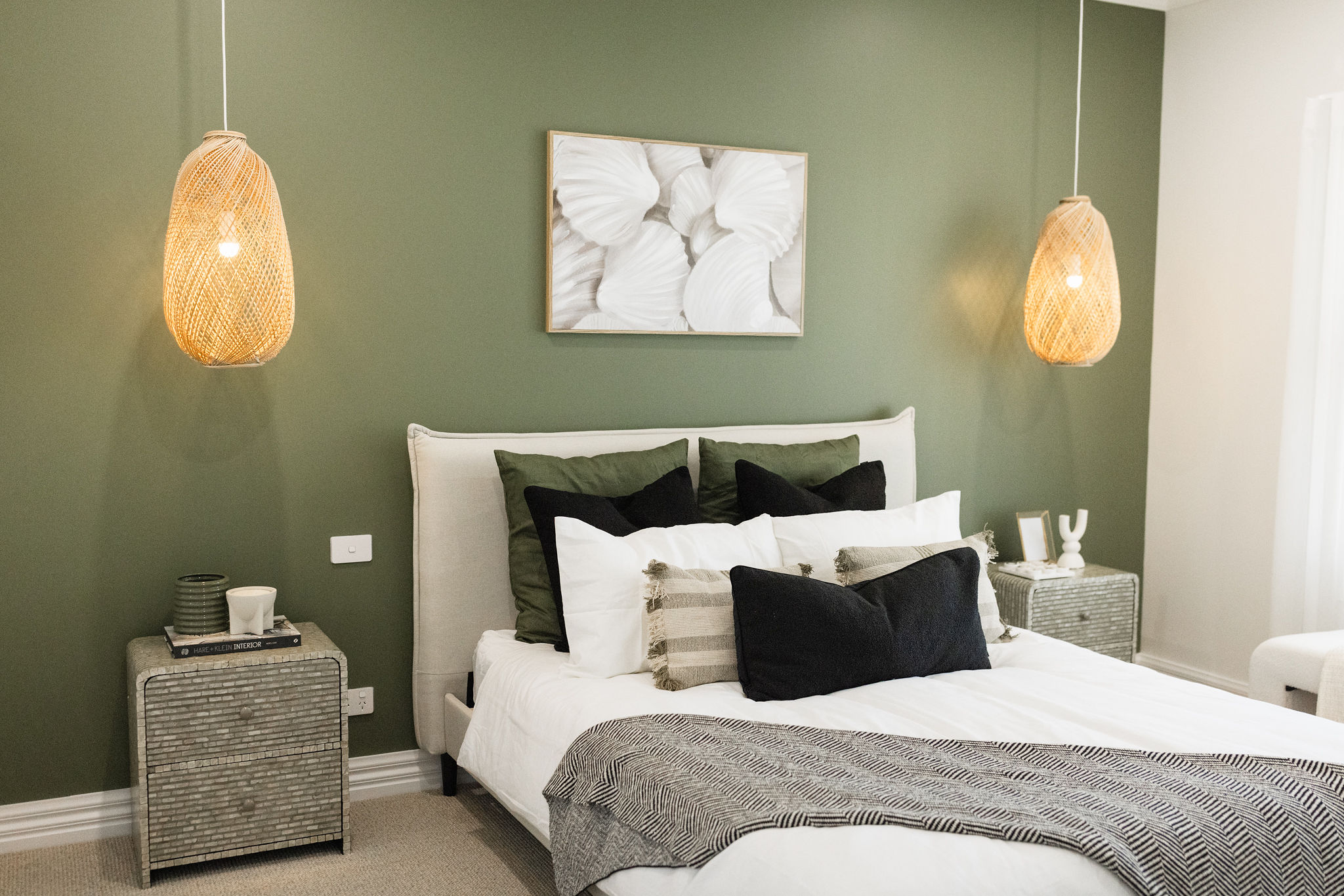 bedroom with green feature wall